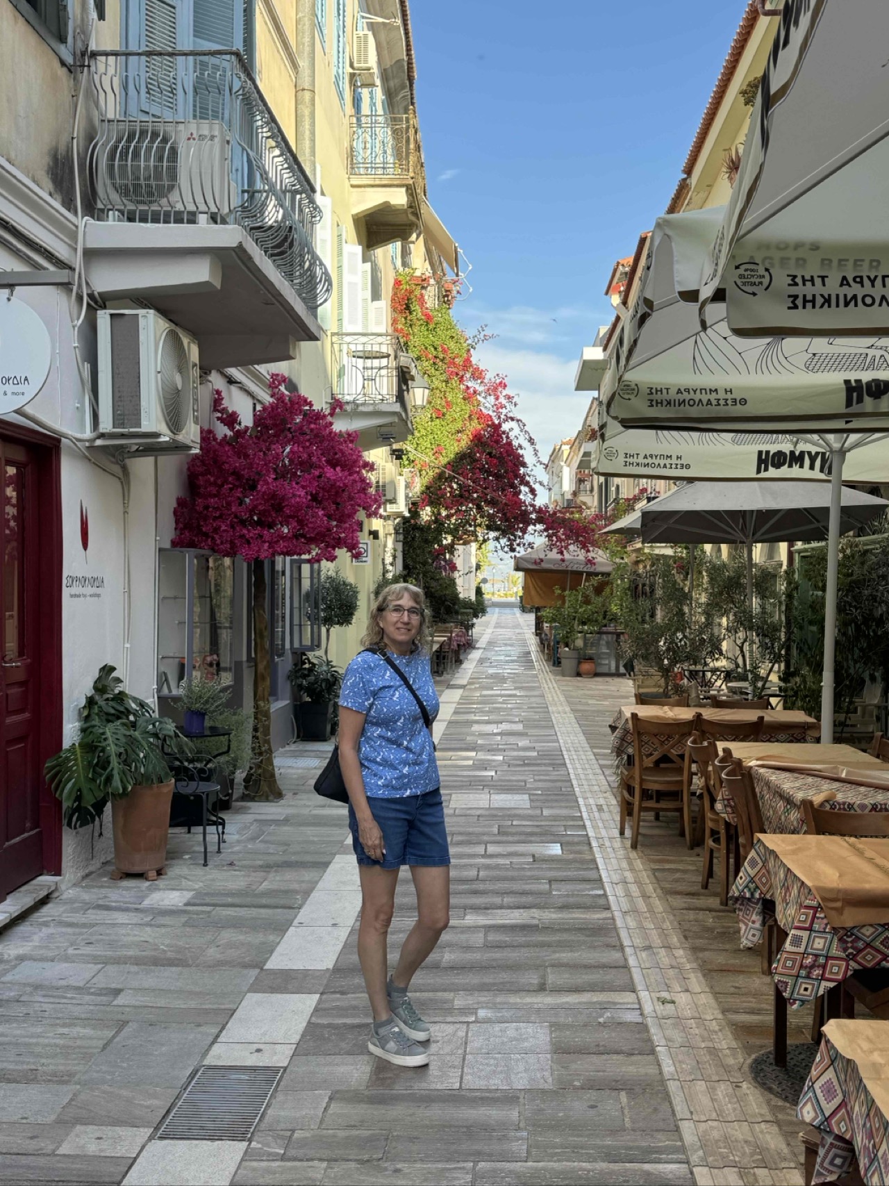 Lots of city streets with bougainvillea