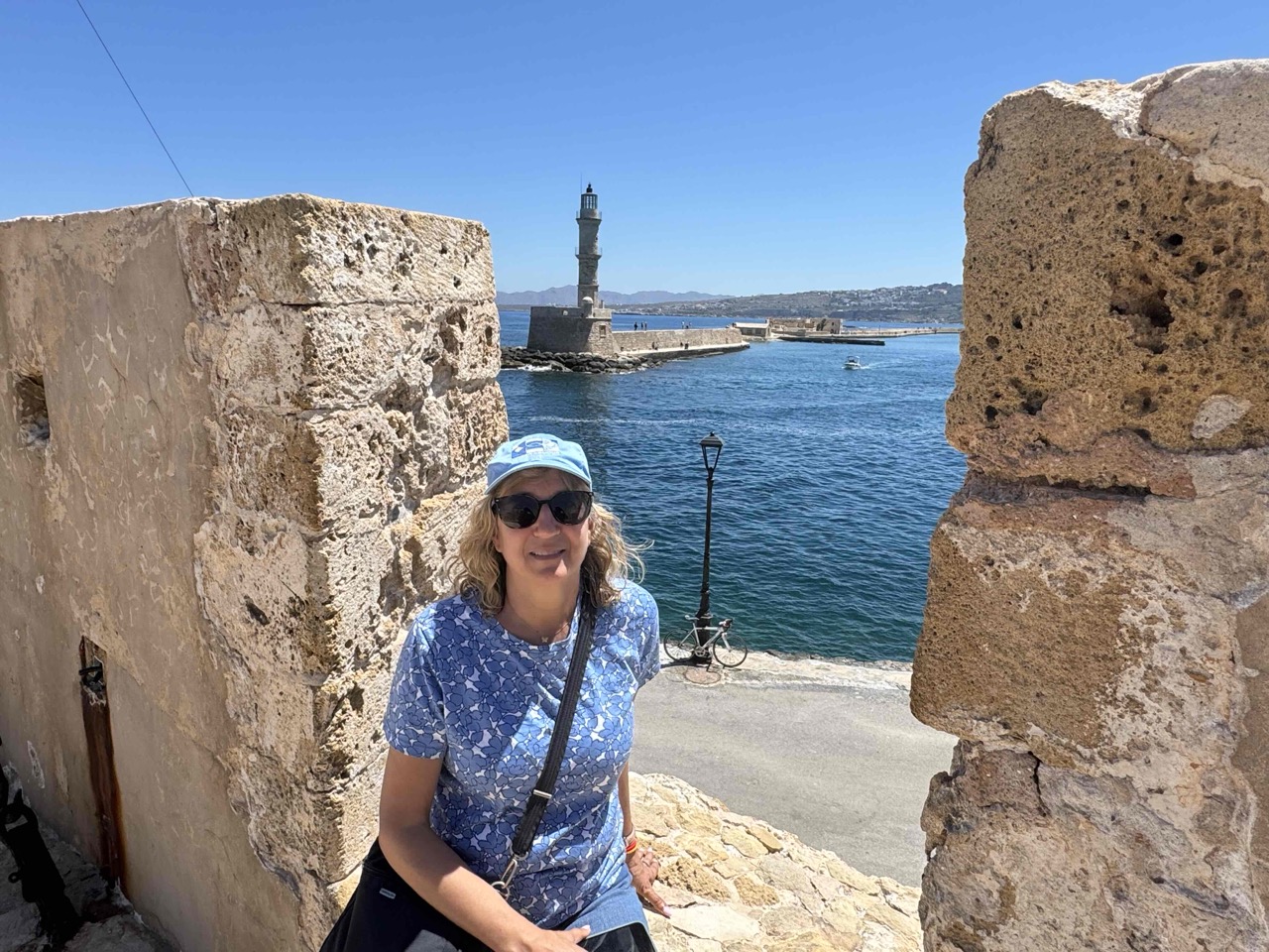 Overlooking the Lighthouse and a Seaborne Quest cruise ship anchored outside the harbor.